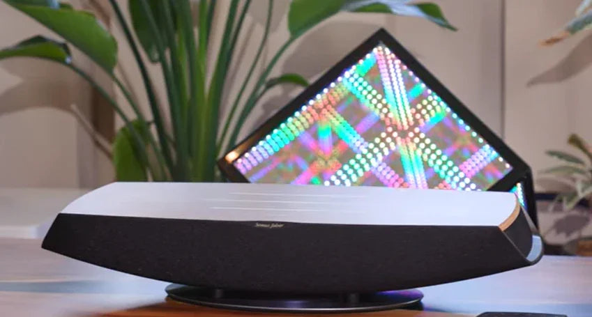 Sonus Faber Omnia wireless speaker on table, modern decor, premium audio equipment