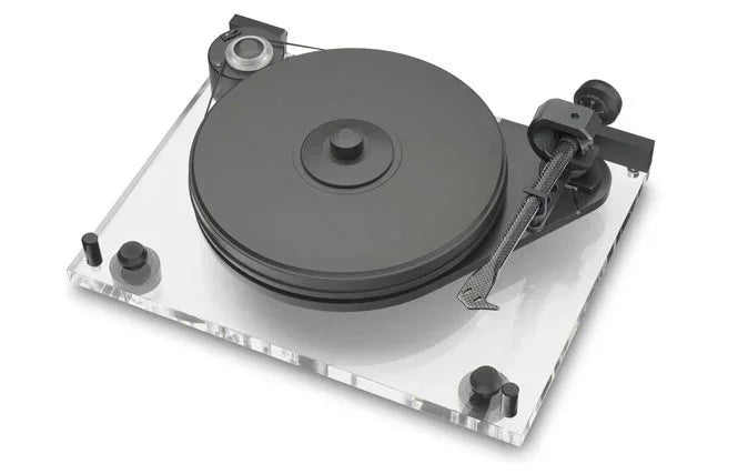 High-end turntable with clear acrylic base and black tonearm, premium audio equipment