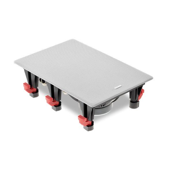 Rectangular in-wall audio speaker with black frame and red mounting clips, high-fidelity driver.
