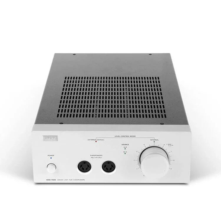 STAX SRM-700S headphone amplifier with silver front panel, input controls, and ear speaker ports