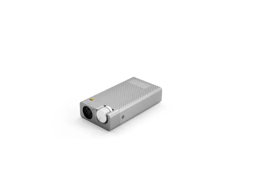 STAX SRM-D10 portable headphone amplifier silver, shown on white background at The Source AV