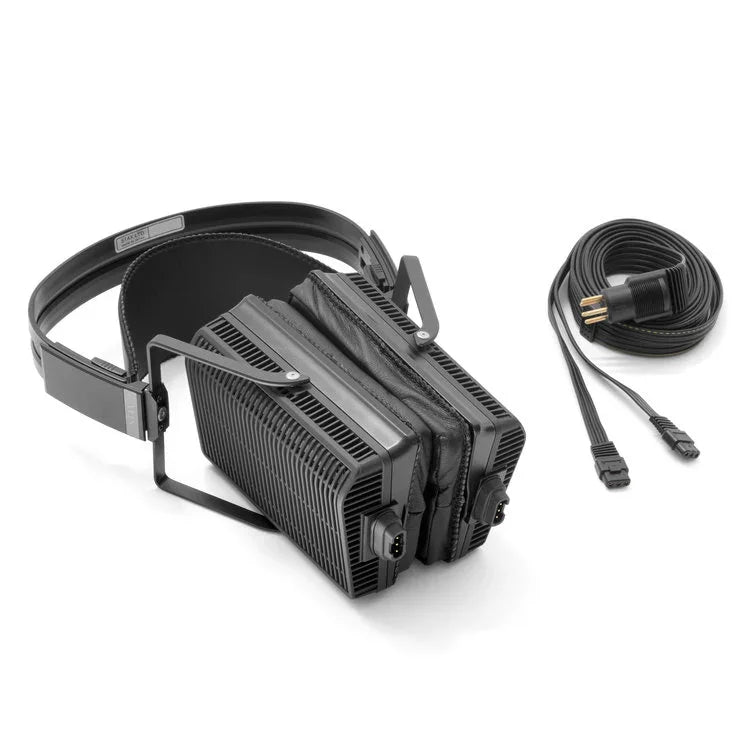 High-end electrostatic headphones with thick rectangular earcups and power cable on white background