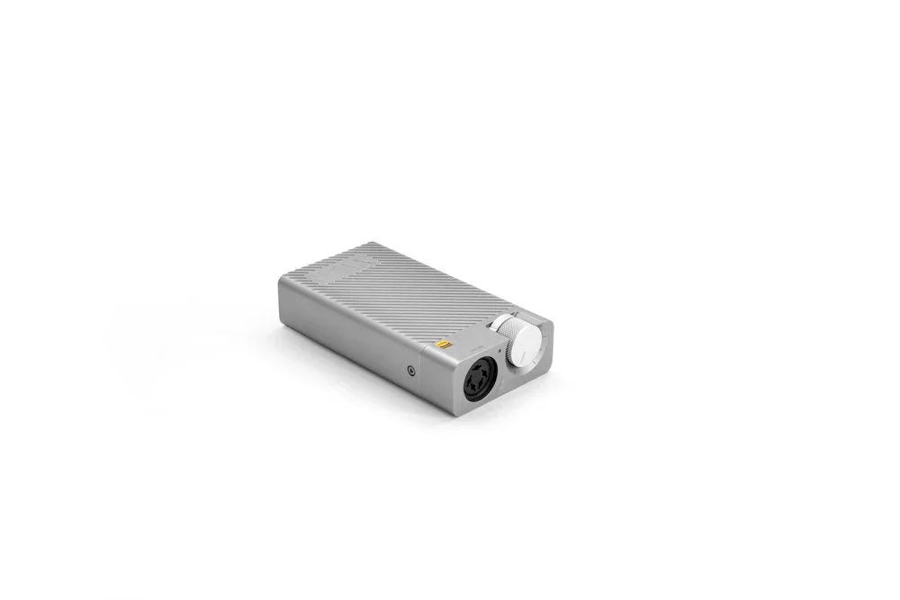 STAX SRM-D10 portable headphone amplifier silver, shown on white background at The Source AV
