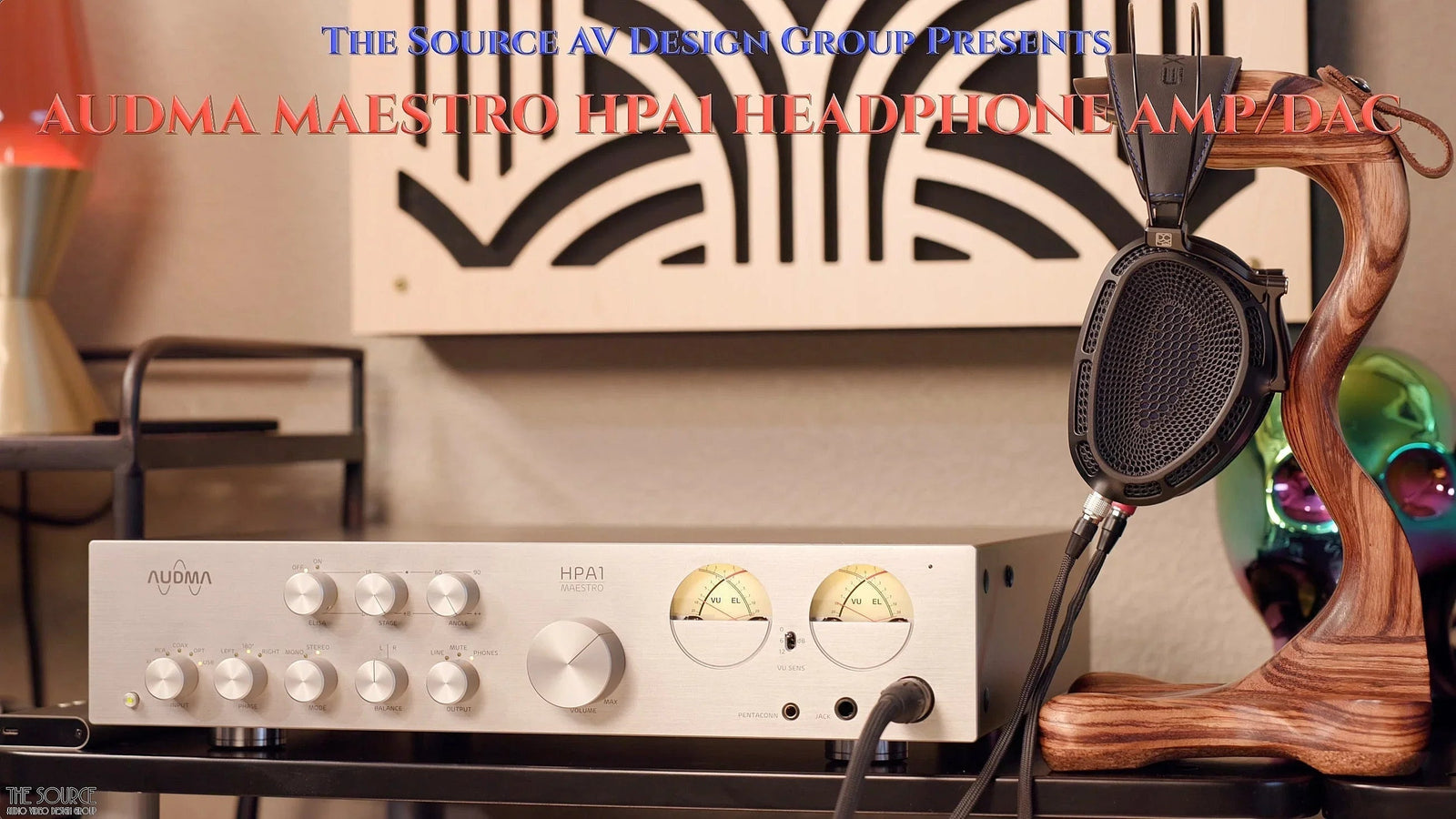 Audma Maestro HPA1 headphone amp DAC with headphones on stand, high-end audio setup at The Source AV